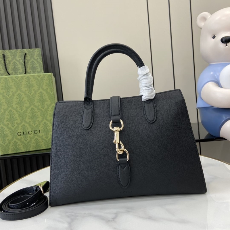 G*u*i top handle bags